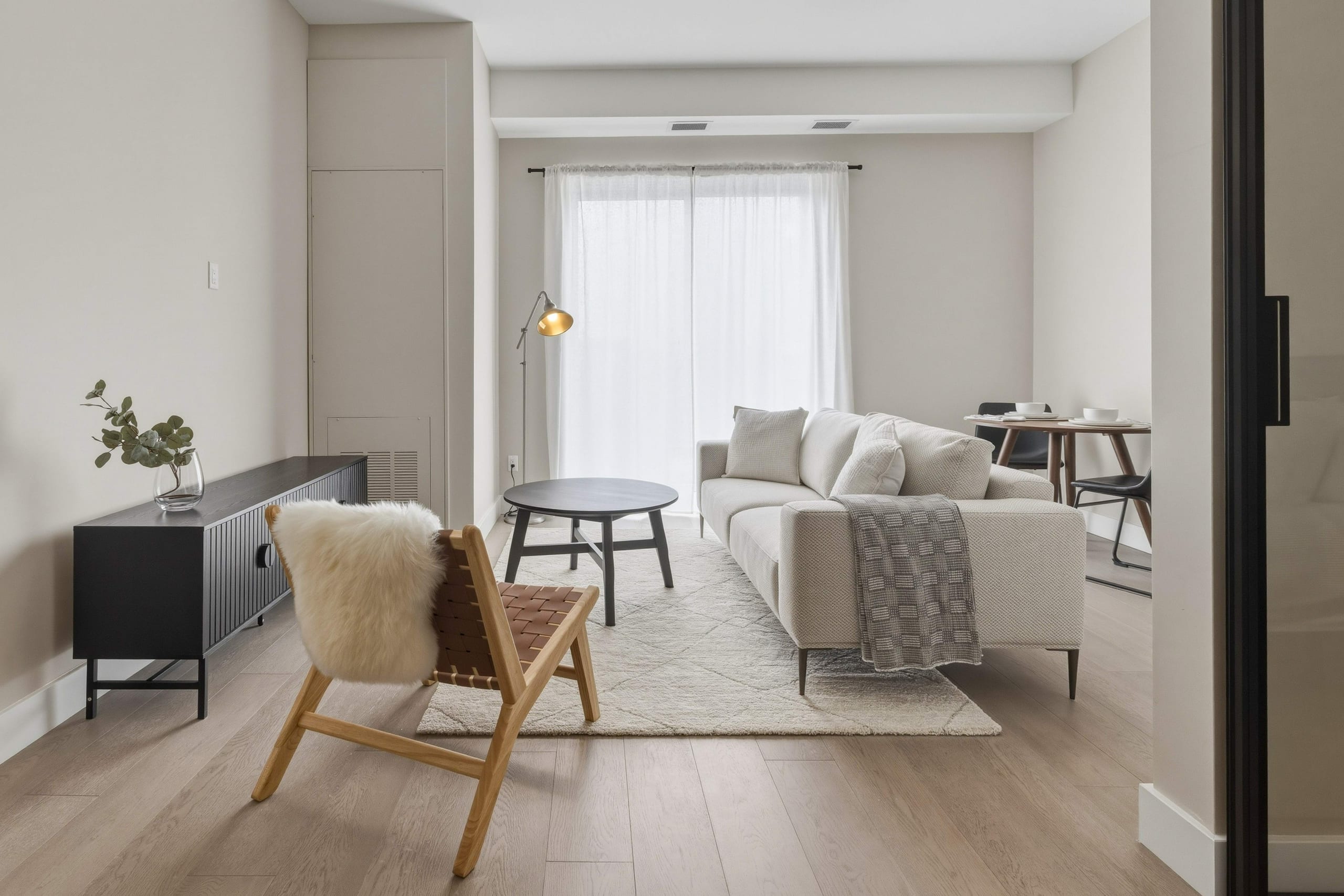Living room with sofa and dining area